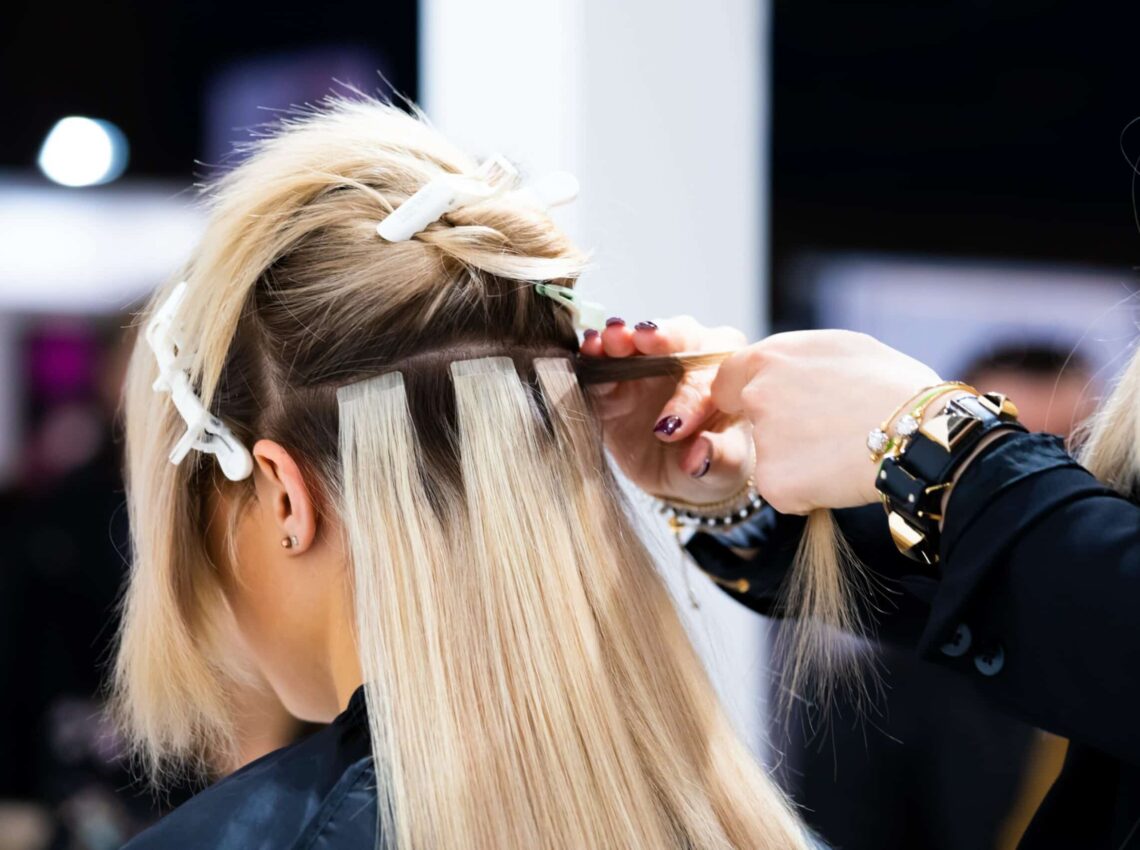 Woman with seamless tape-in extensions